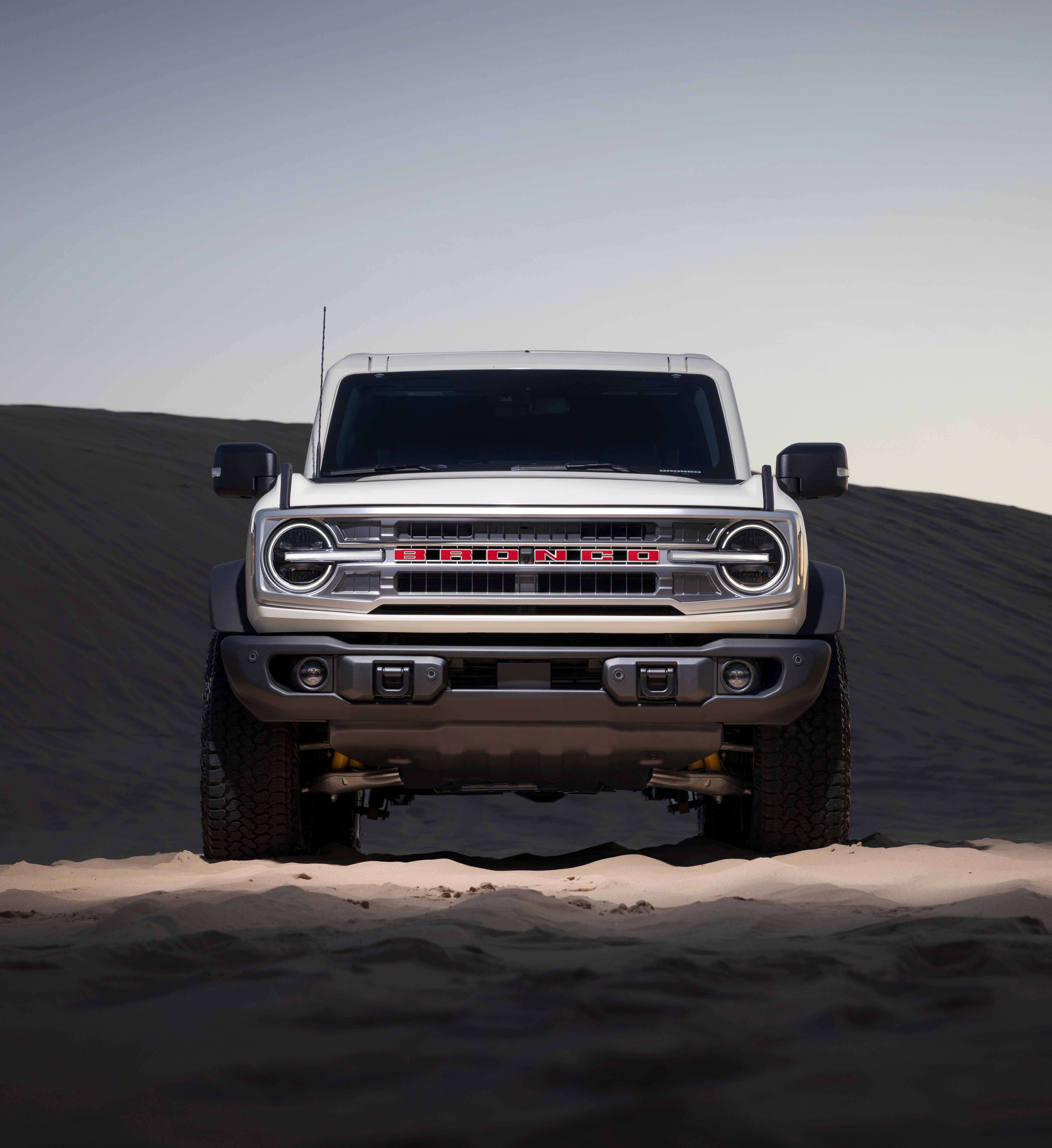Preproduction model shown. The Bronco 60th Anniversary Package blends bolder colors and accents in the cabin, timeless visuals on the exterior, and the same uncompromising off-road capability owners expect. 